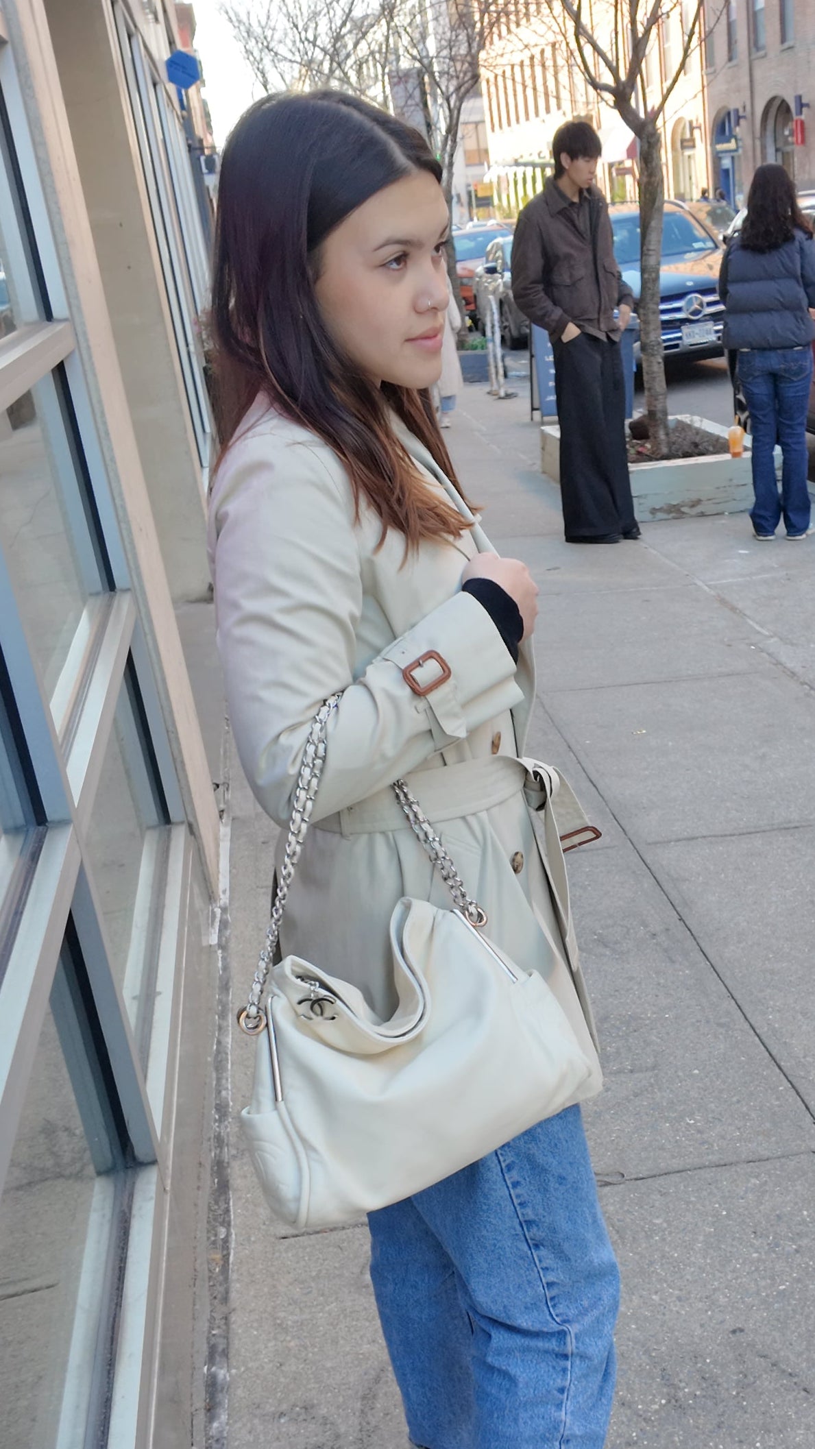 Vintage Chanel off white hobo bag with silver hardware.
