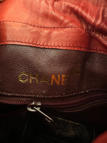 Chanel Red Quilted Lambskin Mini Drawstring Bag with gold hardware