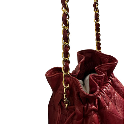 Chanel Red Quilted Lambskin Mini Drawstring Bag with gold hardware