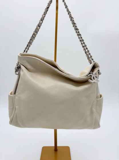 Vintage Chanel off white hobo bag with silver hardware.