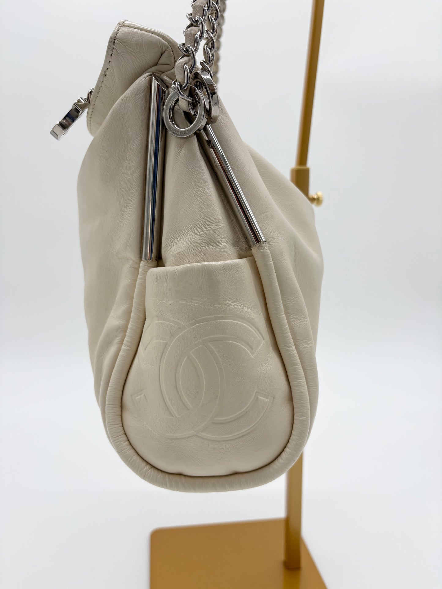 Vintage Chanel off white hobo bag with silver hardware.