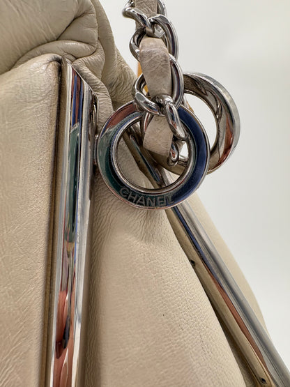 Vintage Chanel off white hobo bag with silver hardware.