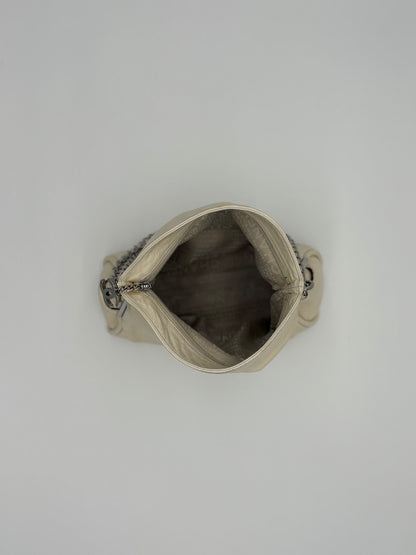 Vintage Chanel off white hobo bag with silver hardware.