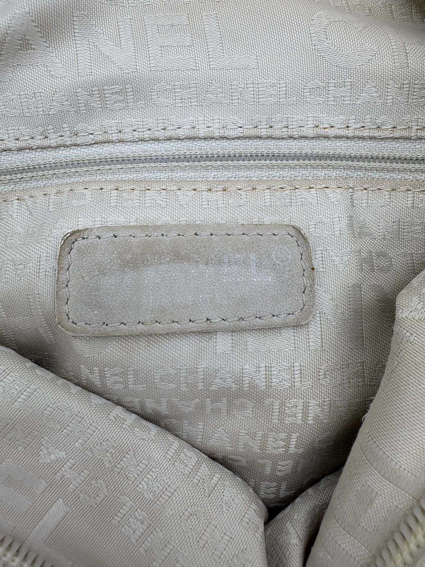 Vintage Chanel off white hobo bag with silver hardware.