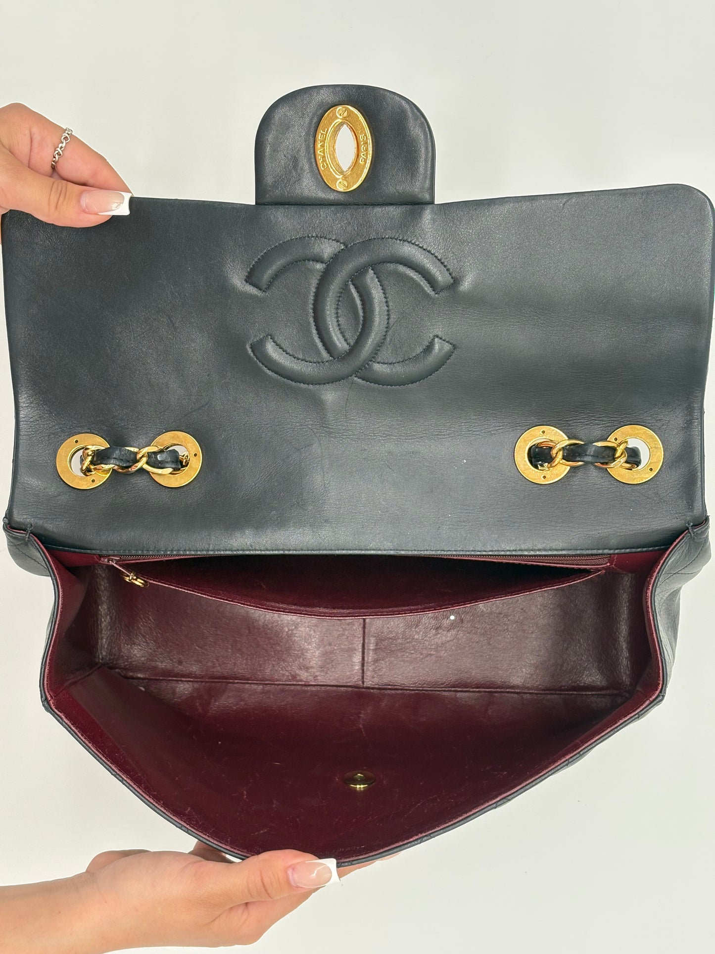1990s Chanel Jumbo Classic Flap in Black Lambskin with 24kt gold plated hardware.