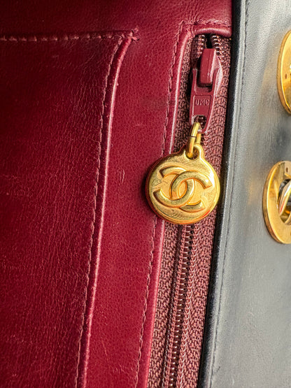 1990s Chanel Jumbo Classic Flap in Black Lambskin with 24kt gold plated hardware.