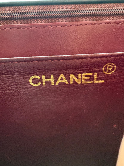 1990s Chanel Jumbo Classic Flap in Black Lambskin with 24kt gold plated hardware.